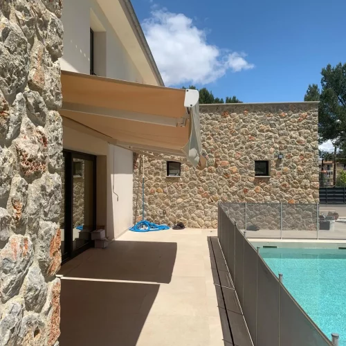 Toldo brazo invisible montaje exterior